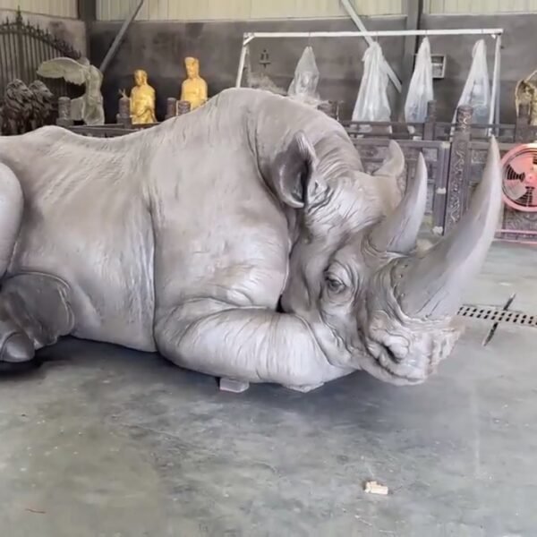 The Resting Rhino – Handcrafted Monumental Solid Brass Sculpture, “The Earth’s Armor,” Life-Size Museum-Quality Wildlife Art