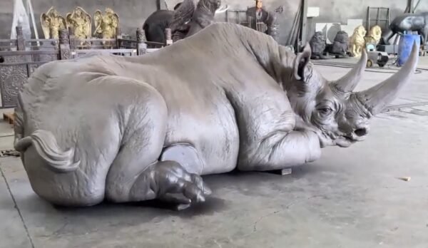 The Resting Rhino – Handcrafted Monumental Solid Brass Sculpture, “The Earth’s Armor,” Life-Size Museum-Quality Wildlife Art