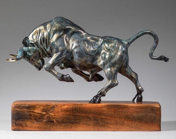 The Pioneer – Handcrafted Solid Brass Charging Bull Sculpture, “Breaking Ground”