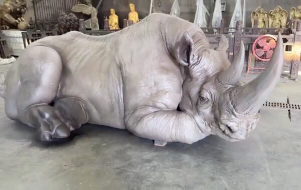 The Resting Rhino – Handcrafted Monumental Solid Brass Sculpture, “The Earth’s Armor,” Life-Size Museum-Quality Wildlife Art